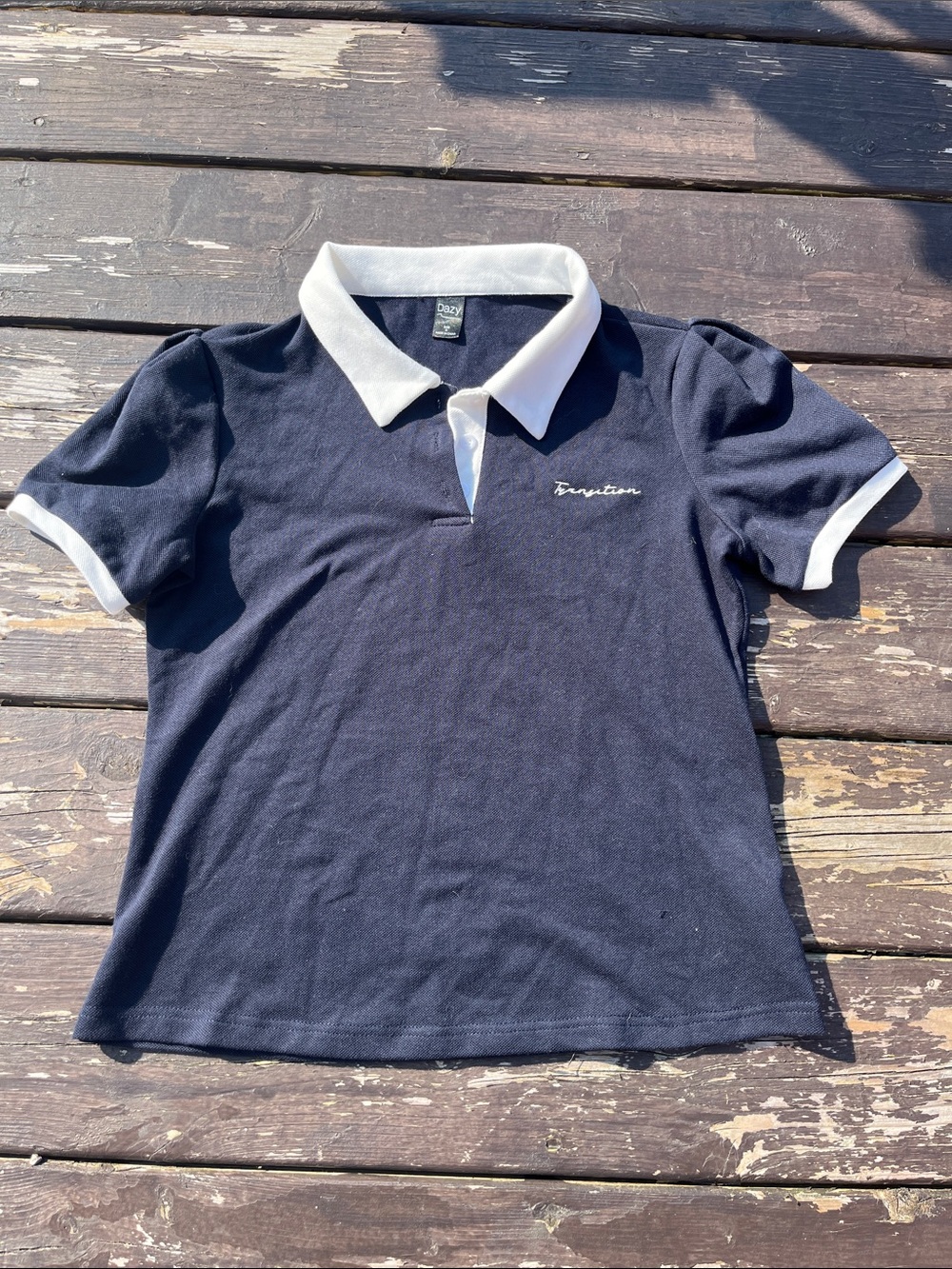 Navy blue and white fitted polo shirt